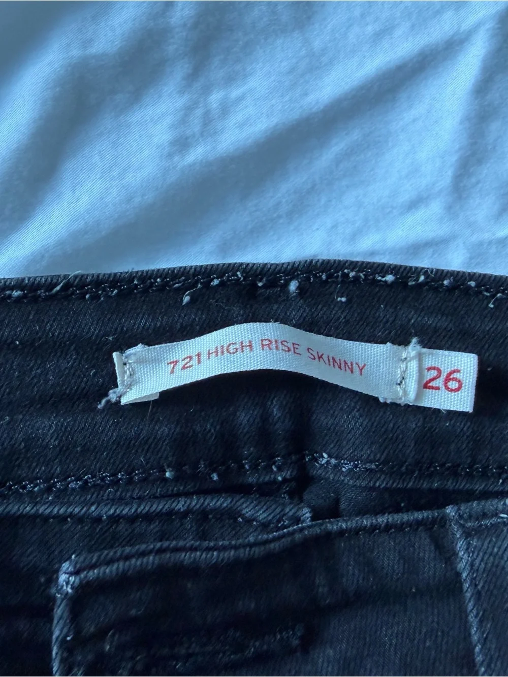 8 pairs of worn Levi black jeans - Size 26